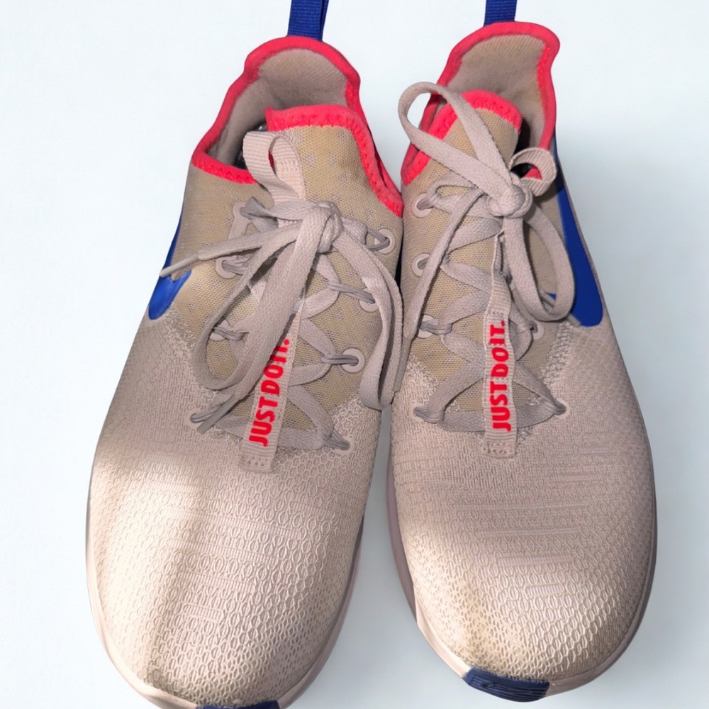 Nike Women's Sneakers with Blue and Pink Accents